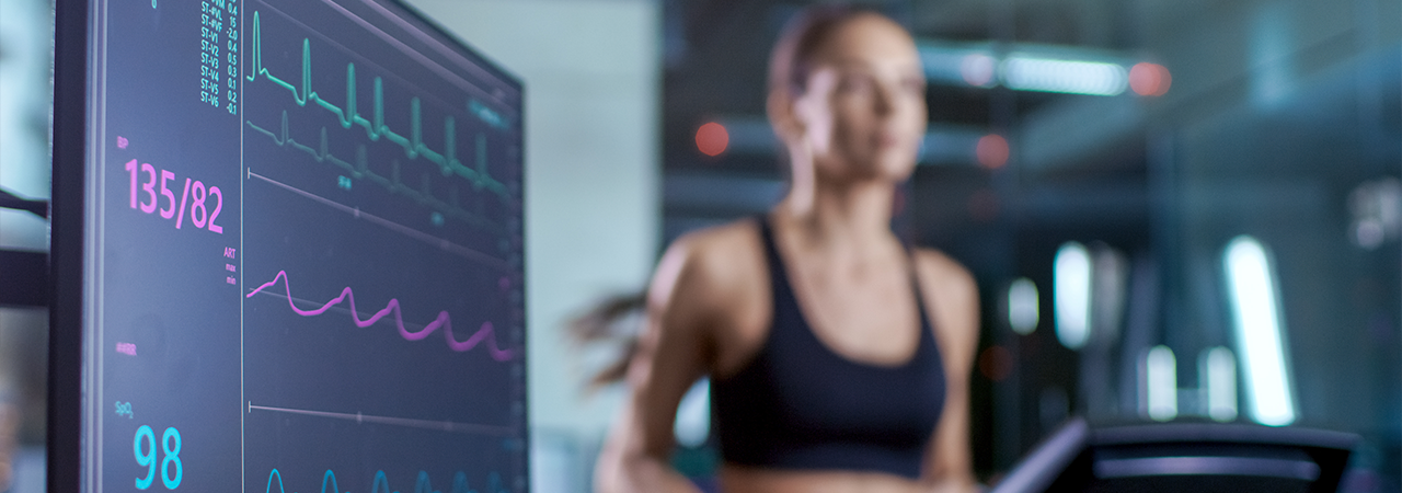 Woman being medically monitored while training